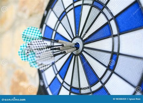 Bullseye on a Wall with Some Darts Stock Image - Image of background ...