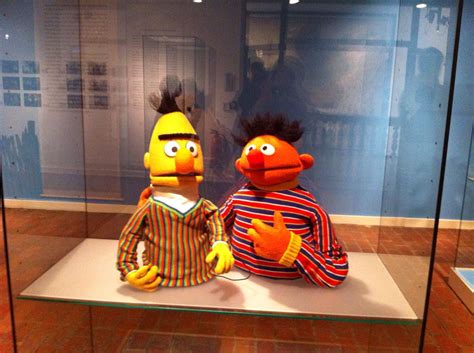 Bert and Ernie puppets on display at an exhibit for Sesamstrasse, the German co-production of ...