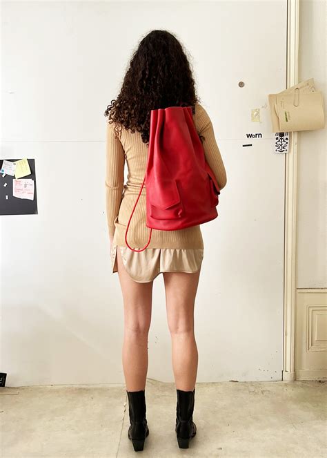 RED BACKPACK - WORNOFFICIAL