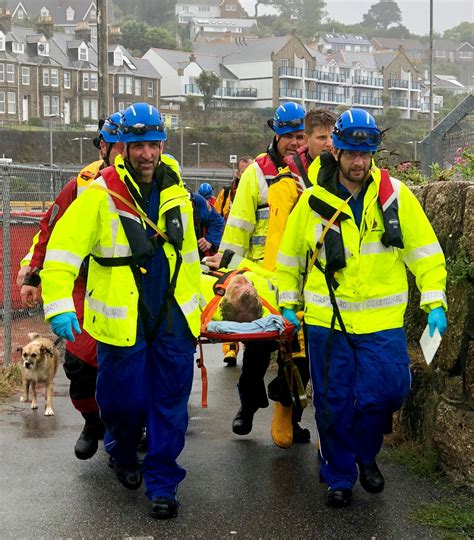 Penlee RNLI volunteer lifeboat crew rescue man from stricken yacht ...