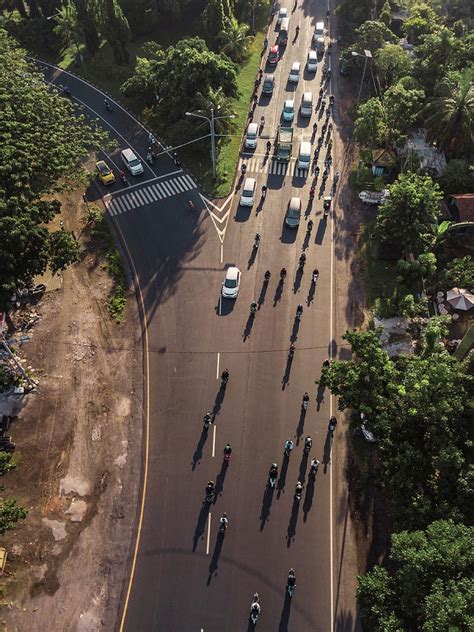 Aerial View Of Cars And Motorbikes On The Road Photograph by Cavan Images - Fine Art America