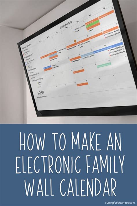 an electronic family wall calendar hanging on the wall with text overlay that reads how to make ...