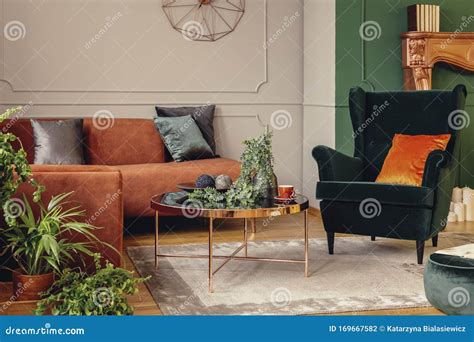 Beautiful Living Room with Grey, Orange and Green Interior Stock Photo ...