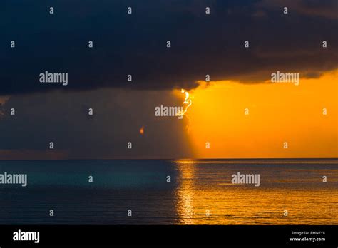 Beautiful colorful sunset in tropical island at Maldives Stock Photo - Alamy