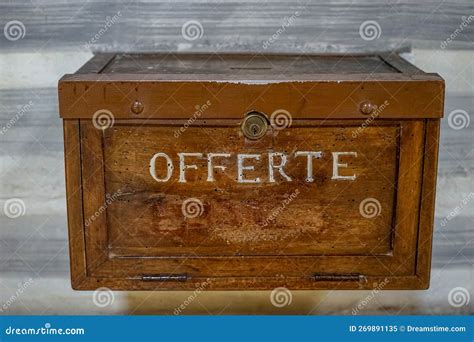 Wooden Box of Alms or Gratuities Written in White Letters "offerte" Fixed on the Wall of the ...