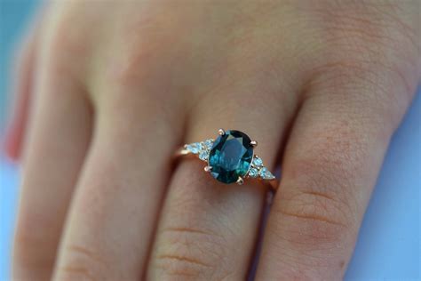 Teal sapphire engagement ring. Peacock green sapphire 3ct oval diamond ...