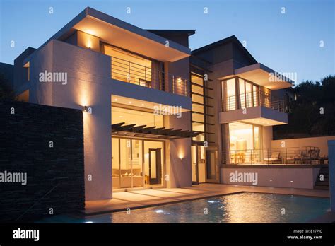 Modern house illuminated at night Stock Photo - Alamy