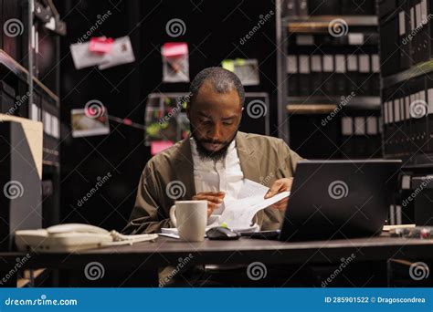 Police Detective Searching Evidence in Crime Case File Stock Photo ...