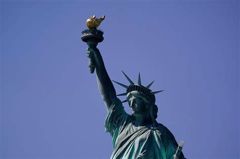 The Statue of Liberty stands as a universal symbol of freedom ...