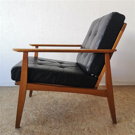 Fauteuil scandinave hêtre et cuir noir années 60 - Côte & Vintage