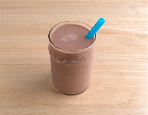 Chocolate Milk with a Straw. Stock Photo - Image of milk, liquid: 76806056