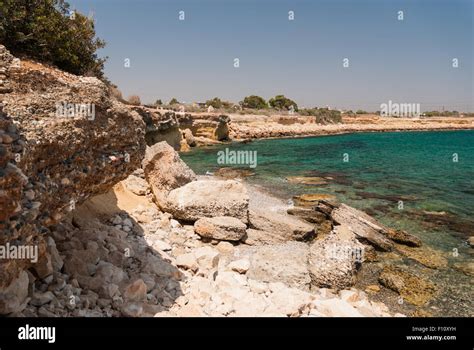 Wild beach with rocks in Dhekelia area. Cyprus Stock Photo - Alamy