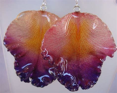 Real Australian Orchid Petal coated in resin … | Resin crafts, Diy resin crafts, Resin jewelry ...