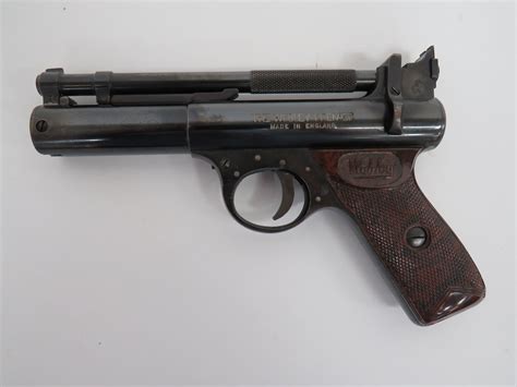 Webley Premier Air Pistol.22, 6 1/2 inch, blued, lift up cocking barrel. Rear locking stirrup ca