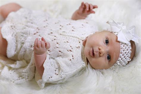 Portrait of a Beautiful Baby Girl in a White Dress Stock Photo - Image ...