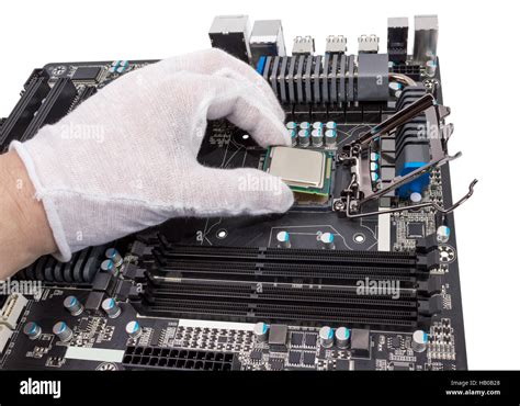 Installation of modern processor in CPU socket Stock Photo - Alamy