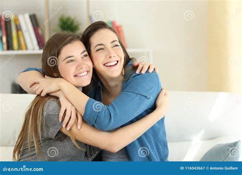 Two Happy Friends or Sisters Hugging at Home Stock Image - Image of ...