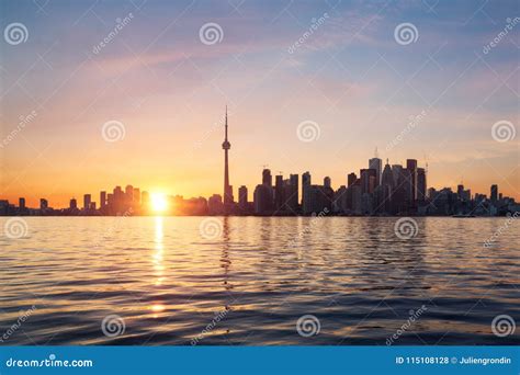 Toronto skyline at sunset stock photo. Image of ontario - 115108128