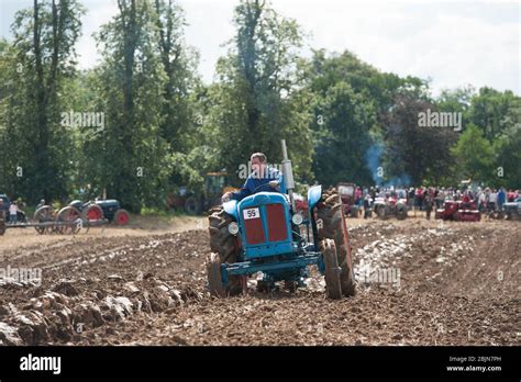 Vintage Tractors ploughing Stock Photo - Alamy