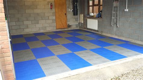 Garage floor revamped with Dynotile in grey and blue | Garage floor ...