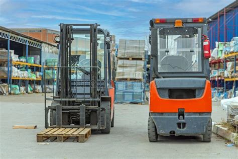 Forklifts Vehicles Warehouse Stock Photo - Image of machine, europe ...