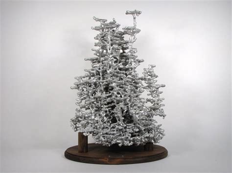 Ant Colony Sculptures Made by Pouring Molten Metal into Ant Nests