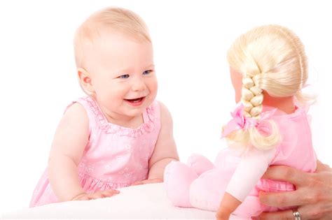 Baby Girl And Doll Free Stock Photo - Public Domain Pictures