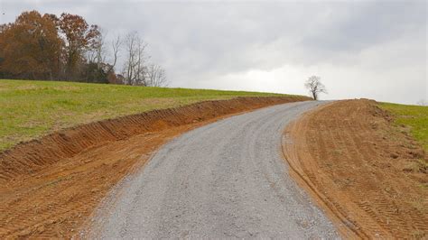 Building a Low-Cost Gravel Road For the Homestead - YouTube