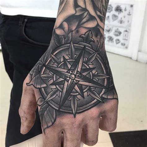 Compass tattoo on the hand by Luke.A.Ashley - Tattoogrid.net