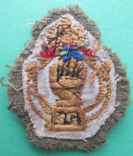 A ROYAL ARMOURED CORPS CLOTH ARM BADGE