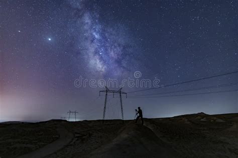 Silhouette of Photographer Taking Pictures of the Night Sky Stock Photo ...