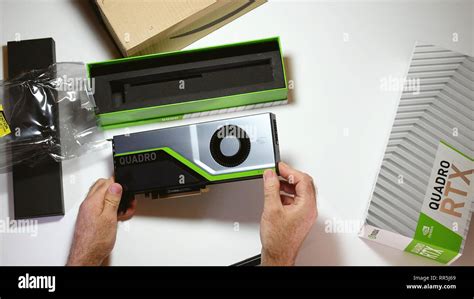 Paris, France - Feb 20, 2019: POV man unboxing latest Nvidia Quadro RTX ...