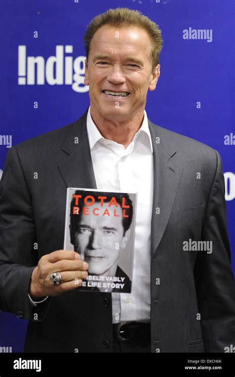 Arnold Schwarzenegger attends a book signing at Indigo Manulife Centre ...