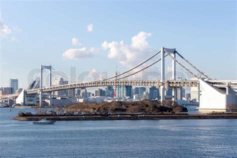 Tokyo Bay with Rainbow Bridge in Odaiba city skyline | Stock image ...