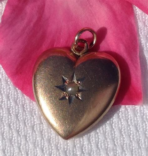 Vintage 14K Gold Pearl Heart Pendant Charm from bestkeptsecrets on Ruby Lane