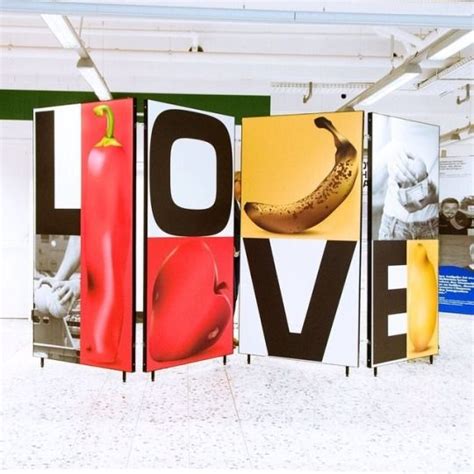 an art installation with multiple images of bananas and love