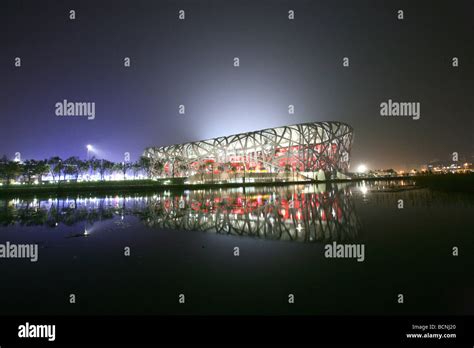 Bird's Nest at night, Beijing, China Stock Photo - Alamy