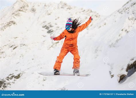 Young Beautiful Girl Snowboarder in Motion Stock Image - Image of snowboarder, activity: 173766137