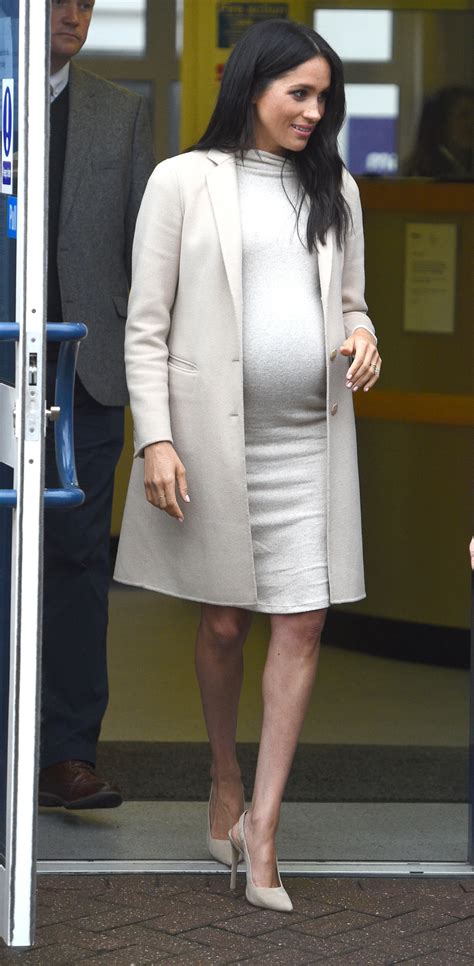 Meghan Markle Shows Off Growing Baby Bump In Affordable H&M Dress | iHeartRadio