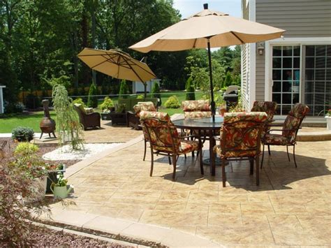 Stamped Concrete Patio with a Paver Retaining Wall - New Jersey Masonry ...