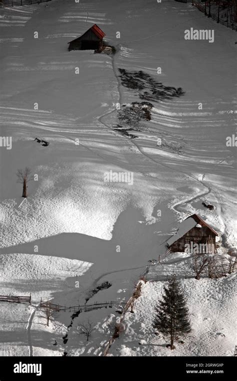 Winter in mountain village Stock Photo - Alamy