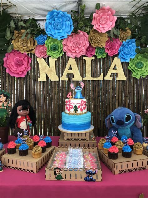 Lilo and Stitch birthday party | 1st birthday party for girls, Birthday party decorations ...