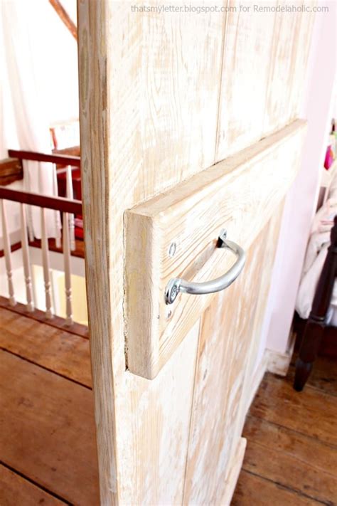 DIY Sliding Barn Door + Inexpensive Hardware | Remodelaholic