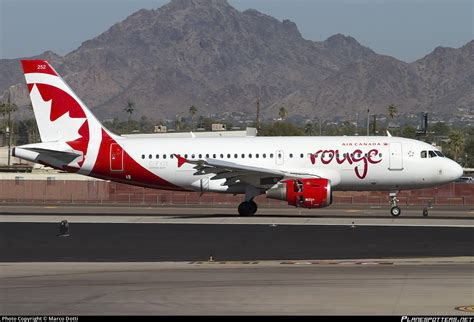 C-FYIY Air Canada Rouge Airbus A319-114 Photo by Marco Dotti | ID 554839 | Planespotters.net