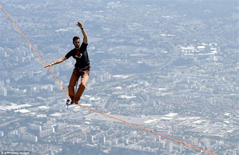 Highlining world record holder Nathan Paulin walks across chasm 800 ...