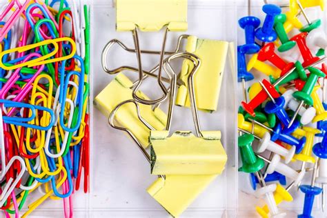 School supplies on white background. Markers, scissors, pencils and paper clips (Flip 2019 ...