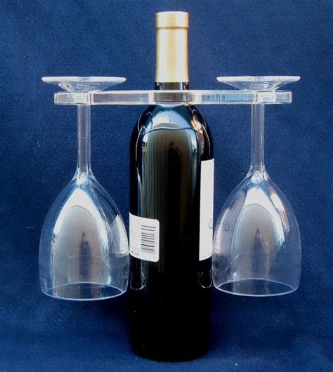 Magic Wine Holder- Clear acrylic wine-glass holders fits over the neck of a bottle to hold two ...
