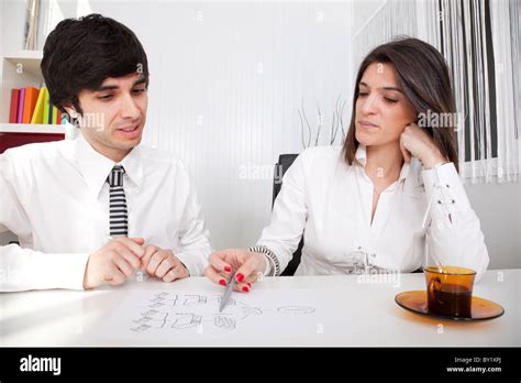 Modern team working at the office at a firewall security diagram Stock Photo - Alamy