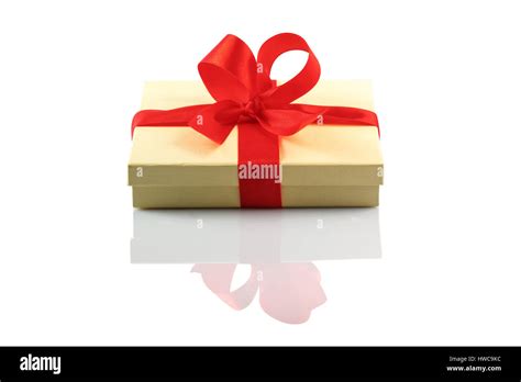 present with red ribbon isolated on white backround Stock Photo - Alamy