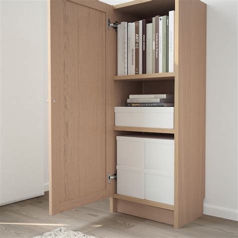 BILLY / OXBERG Bookcase with door - white stained oak veneer - IKEA